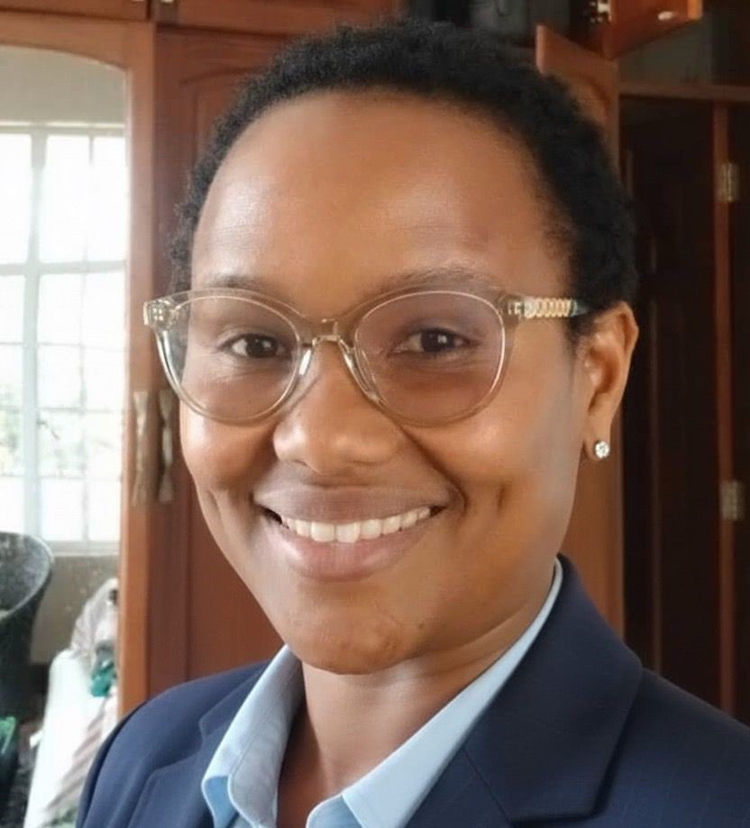 Mesha Pius - Secretary to the Board
